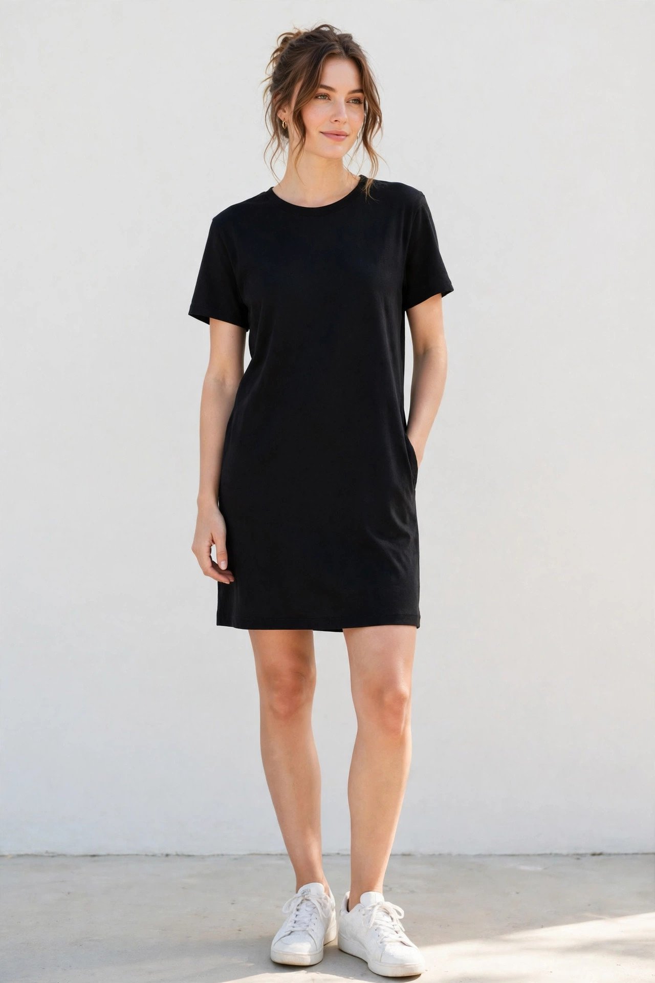 Black t-shirt dress with white sneakers