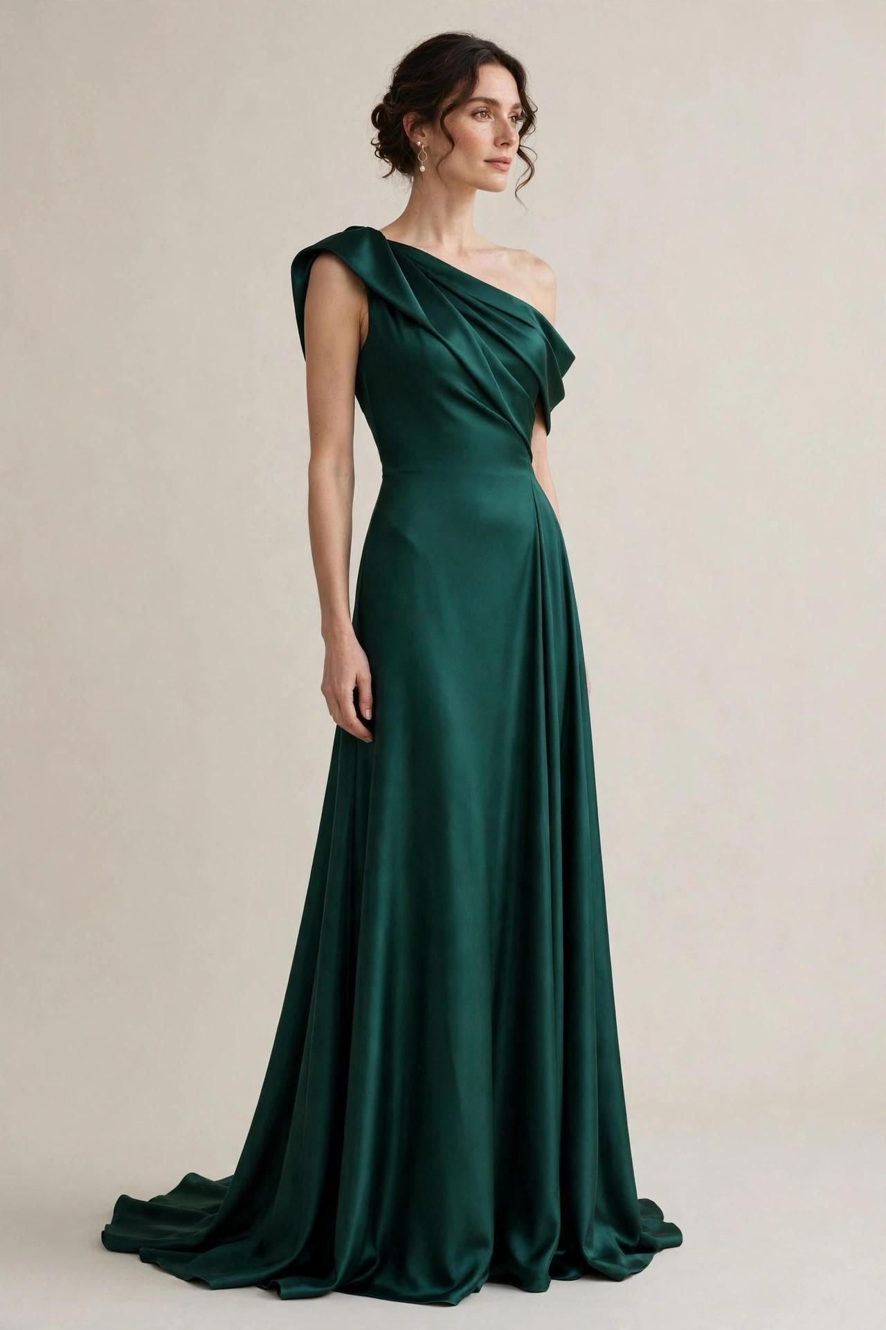 One-shoulder emerald green evening gown