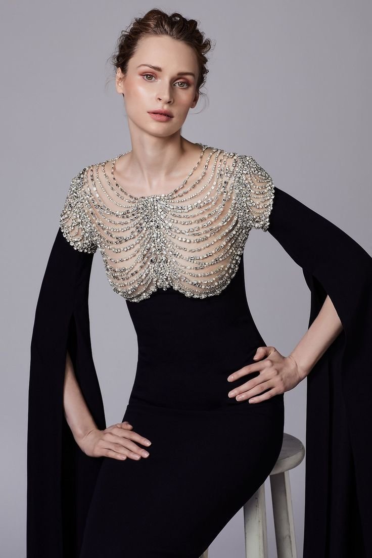 Woman in statement embellished dress glamorous date night look