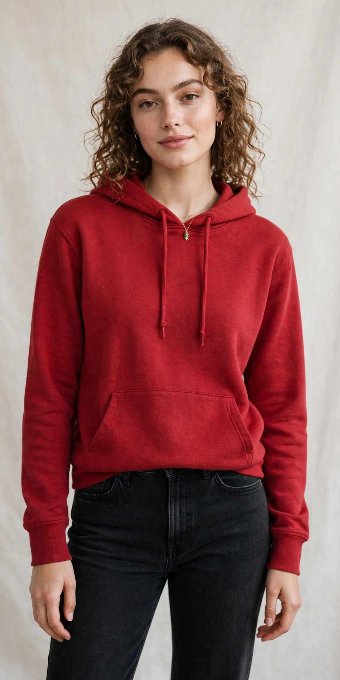 Red hoodie with black jeans