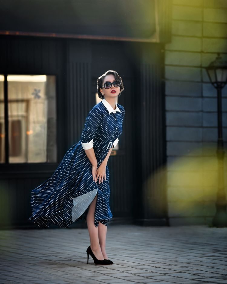 Woman in a polka dot casual dress, retro and playful