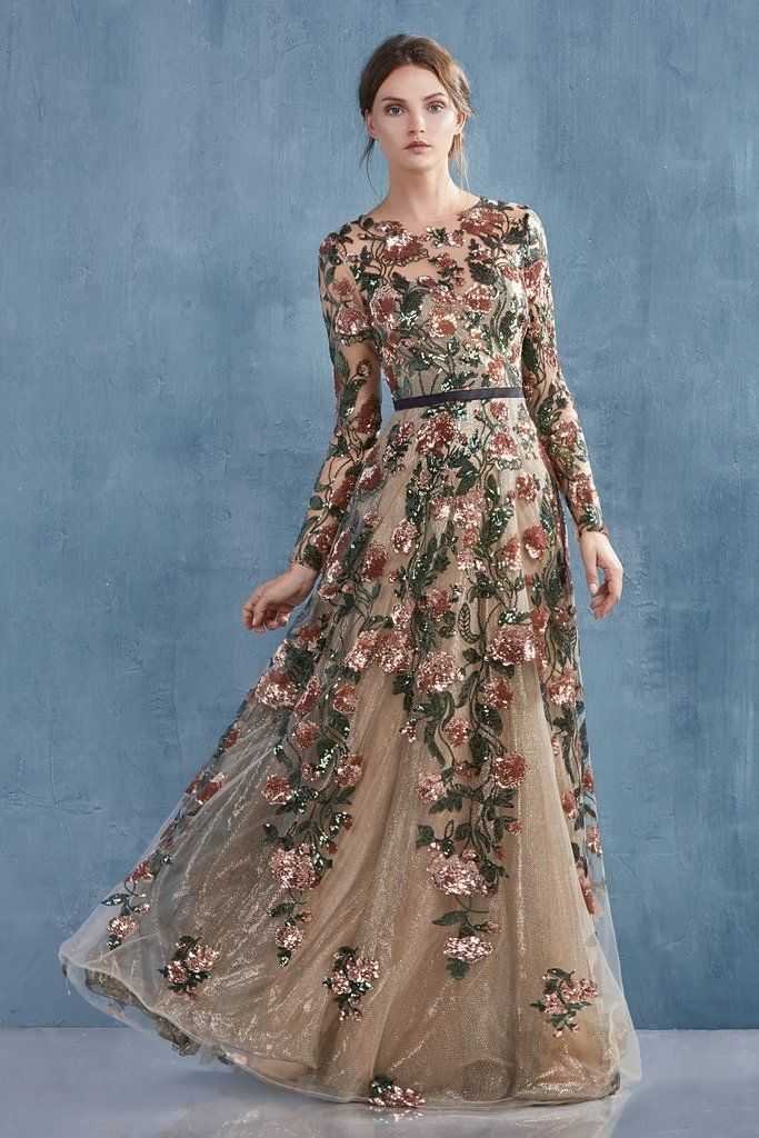 Woman in a floral embroidered tulle gown