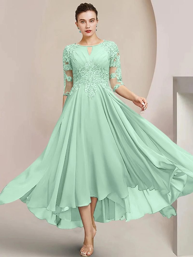 Woman in a mint A-line dress with lace details