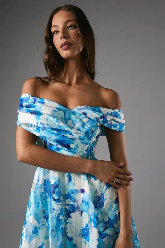 Woman in a soft blue organza midi dress
