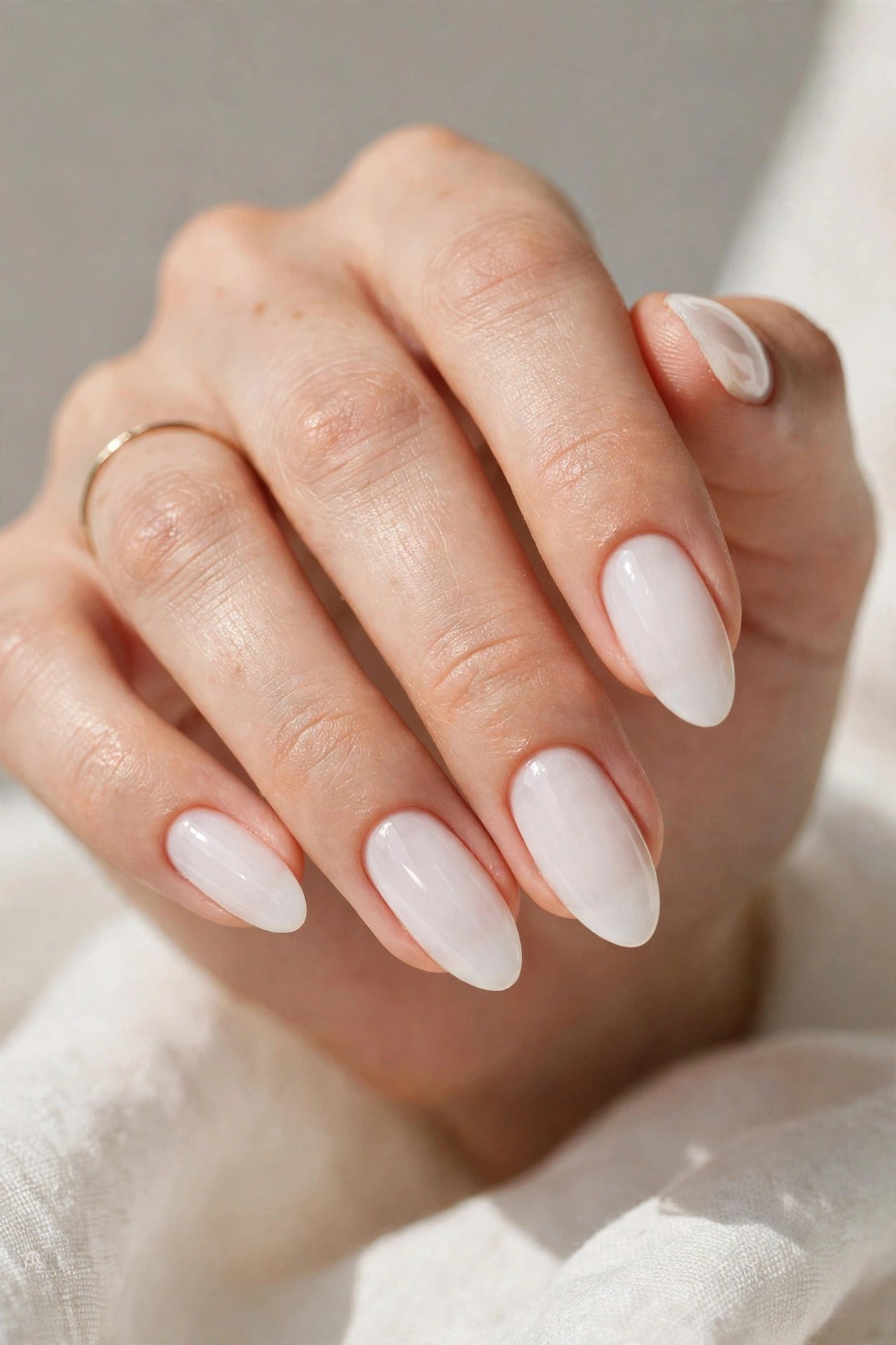 Milky white almond nails