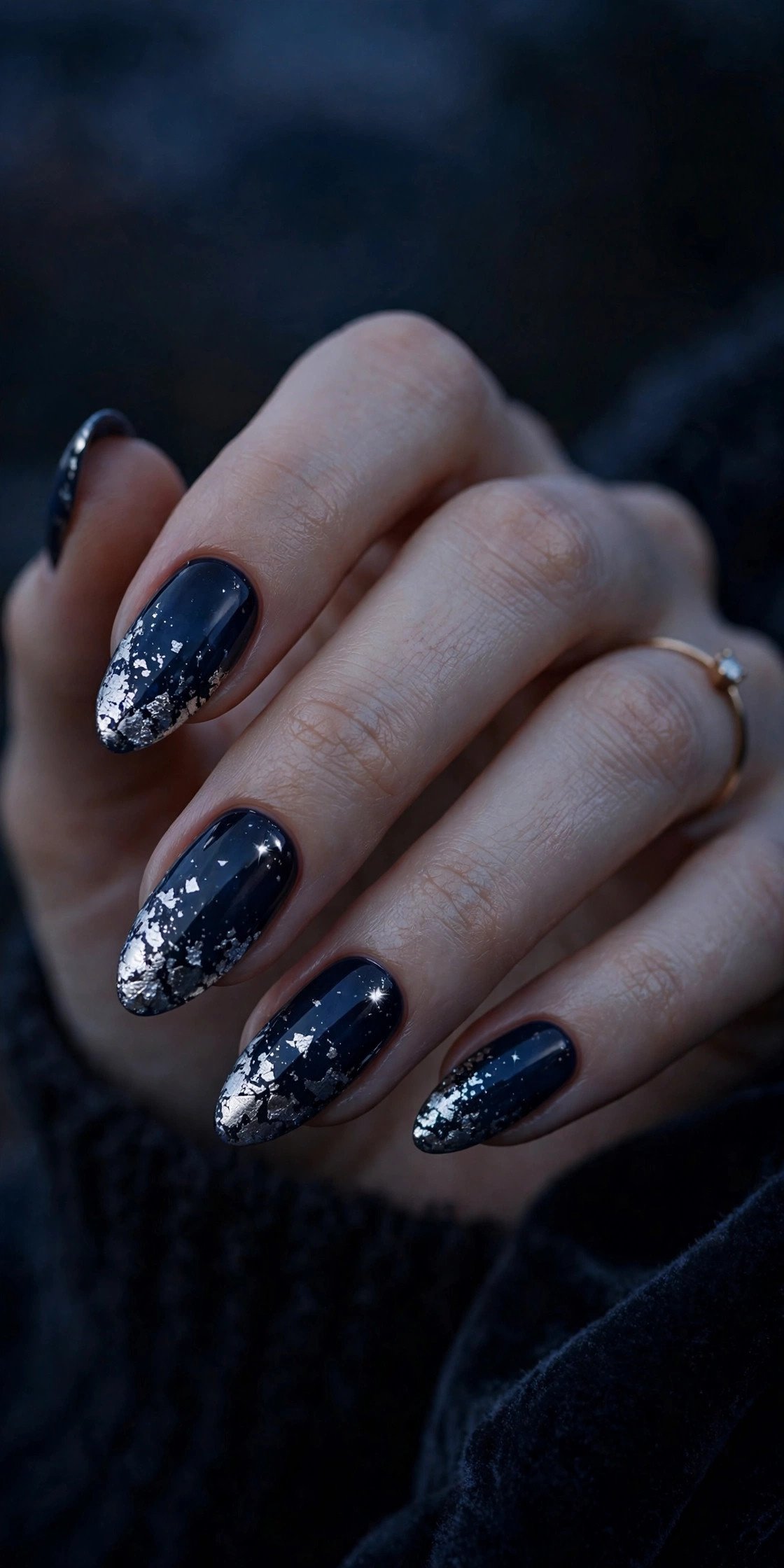Navy blue almond nails with silver foil