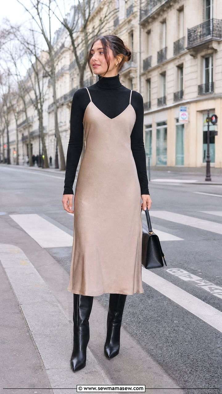 Woman layering a turtleneck under a slip dress