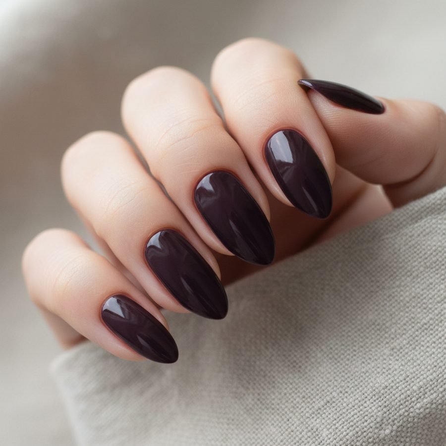 Deep plum almond manicure