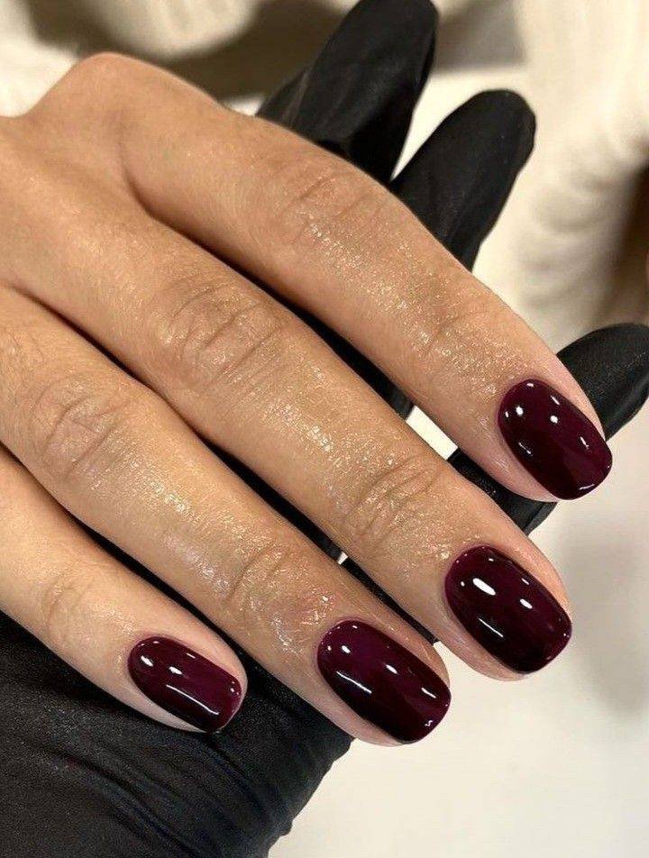 Black cherry dark polish on short nails