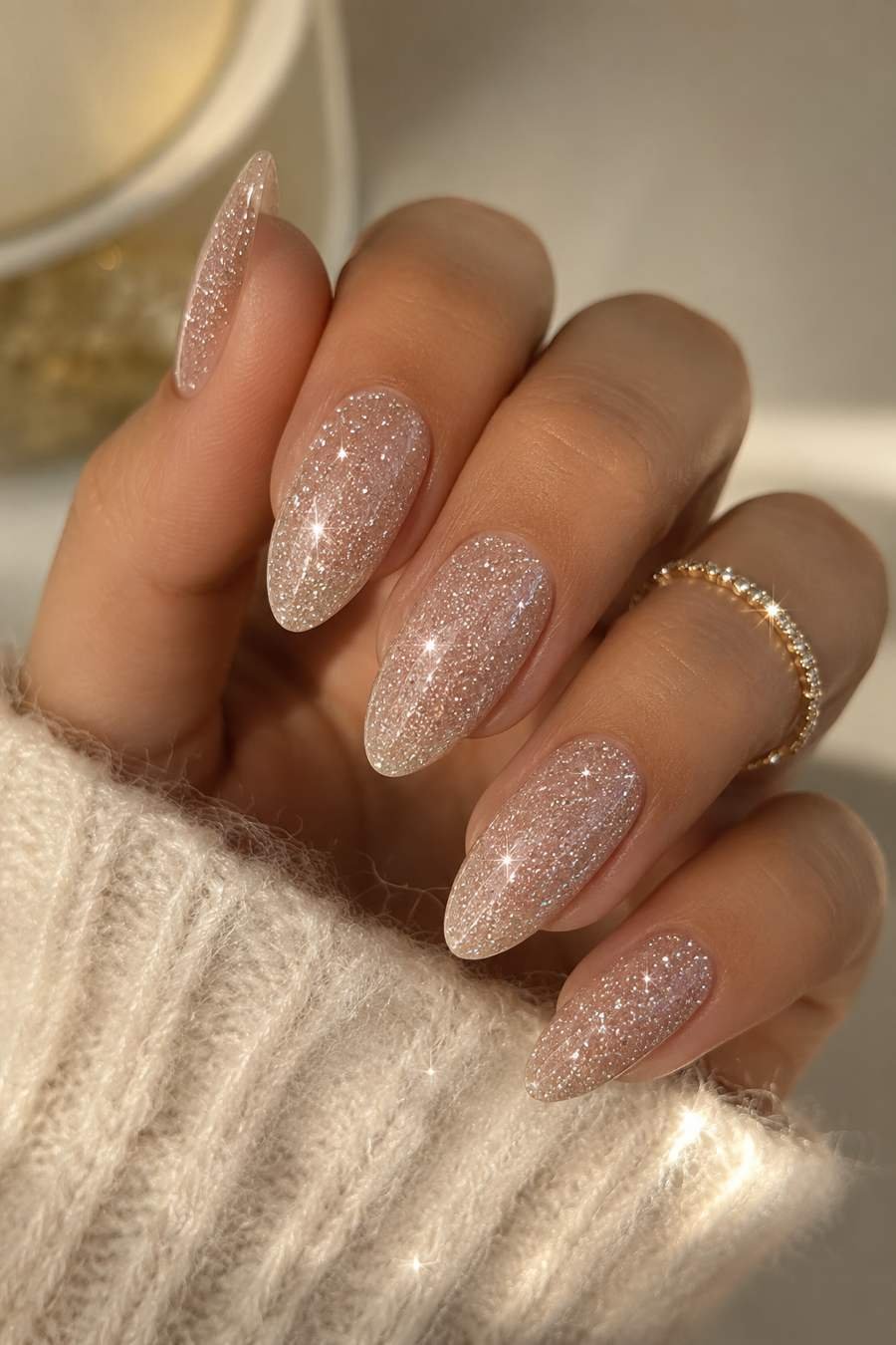 Champagne shimmer polish on short winter nails
