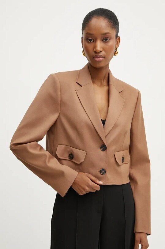 Camel blazer with black trousers, chic professional outfit