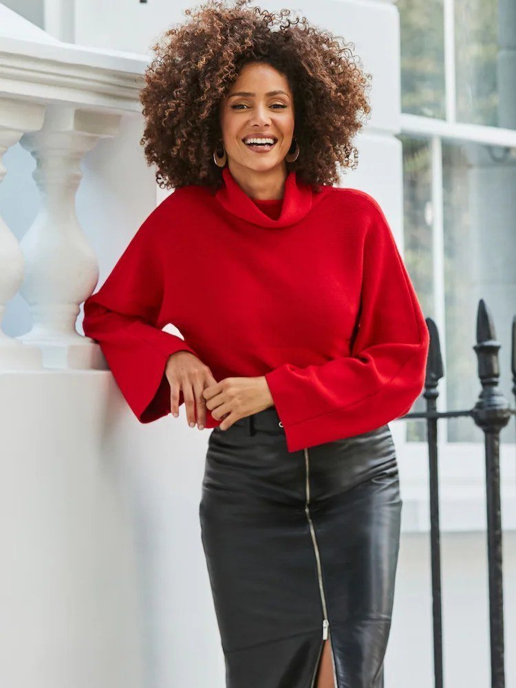 Red turtleneck with black leather skirt