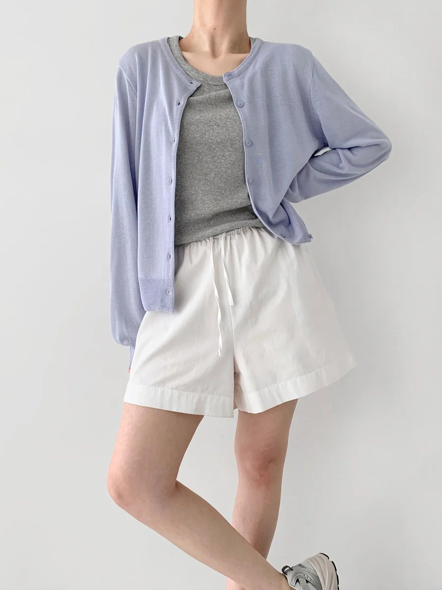 Pastel Cardigan and White Shorts