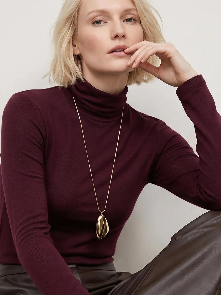 Burgundy Turtleneck and Gold Jewelry