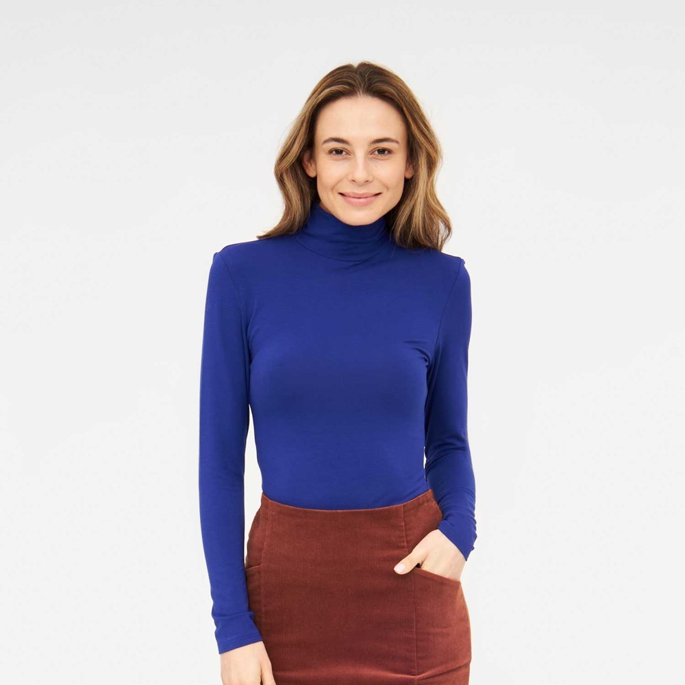 Cobalt turtleneck with corduroy skirt