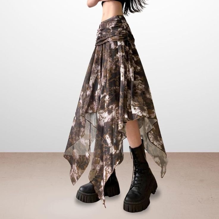 Woman in black trench coat with maxi skirt and boots