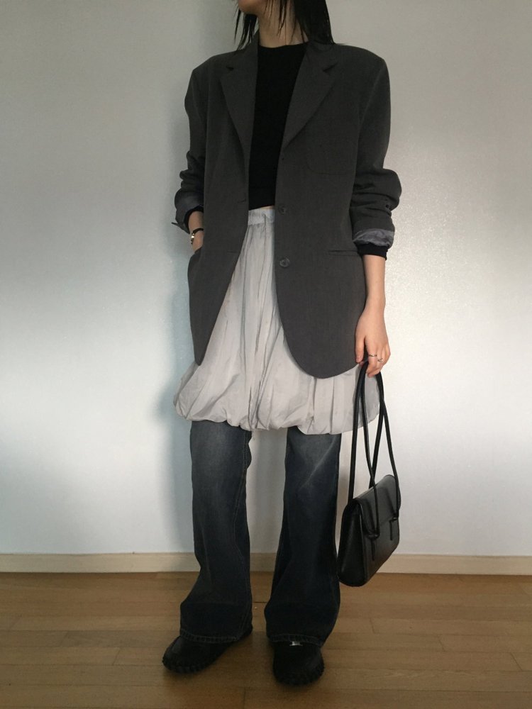 Blazer with mini skirt over jeans smart casual outfit