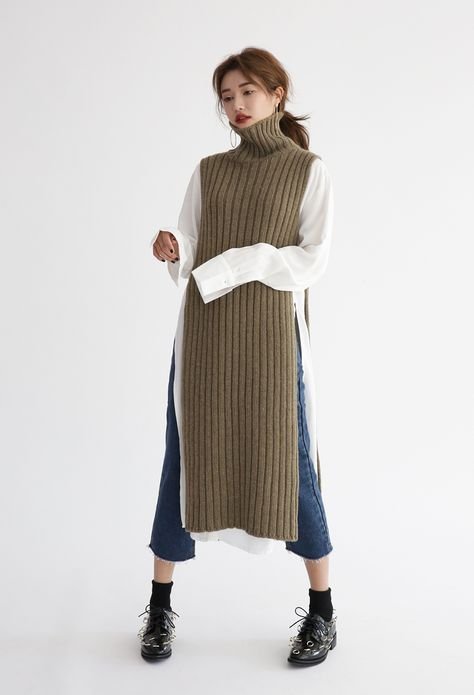 Turtleneck with pleated midi skirt over jeans