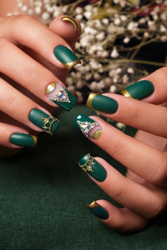 Forest green nails with gold half-moon detail