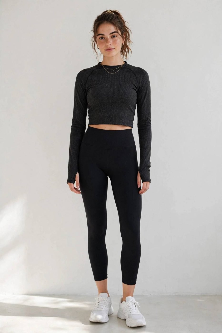 Woman in athletic leggings and cropped top