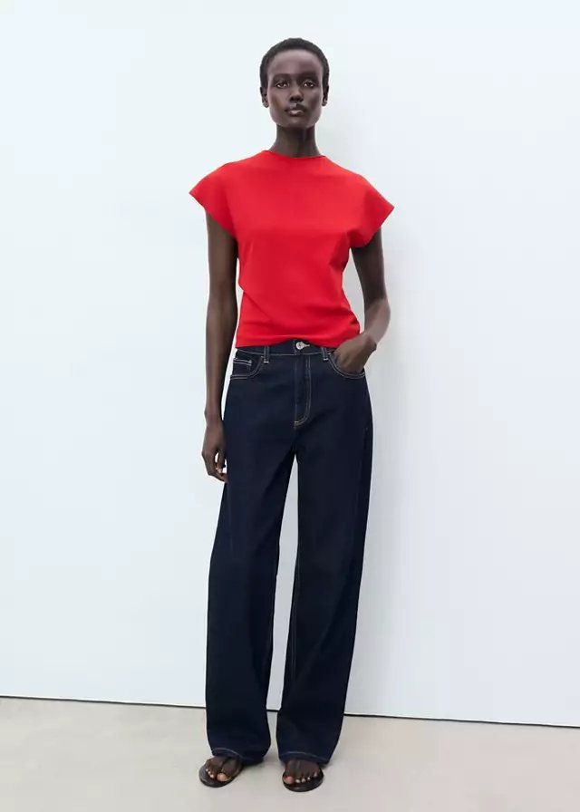 red top with dark jeans