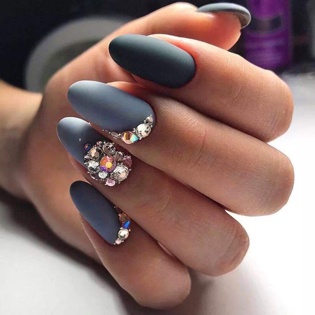 Matte gray nails with tiny gem accent