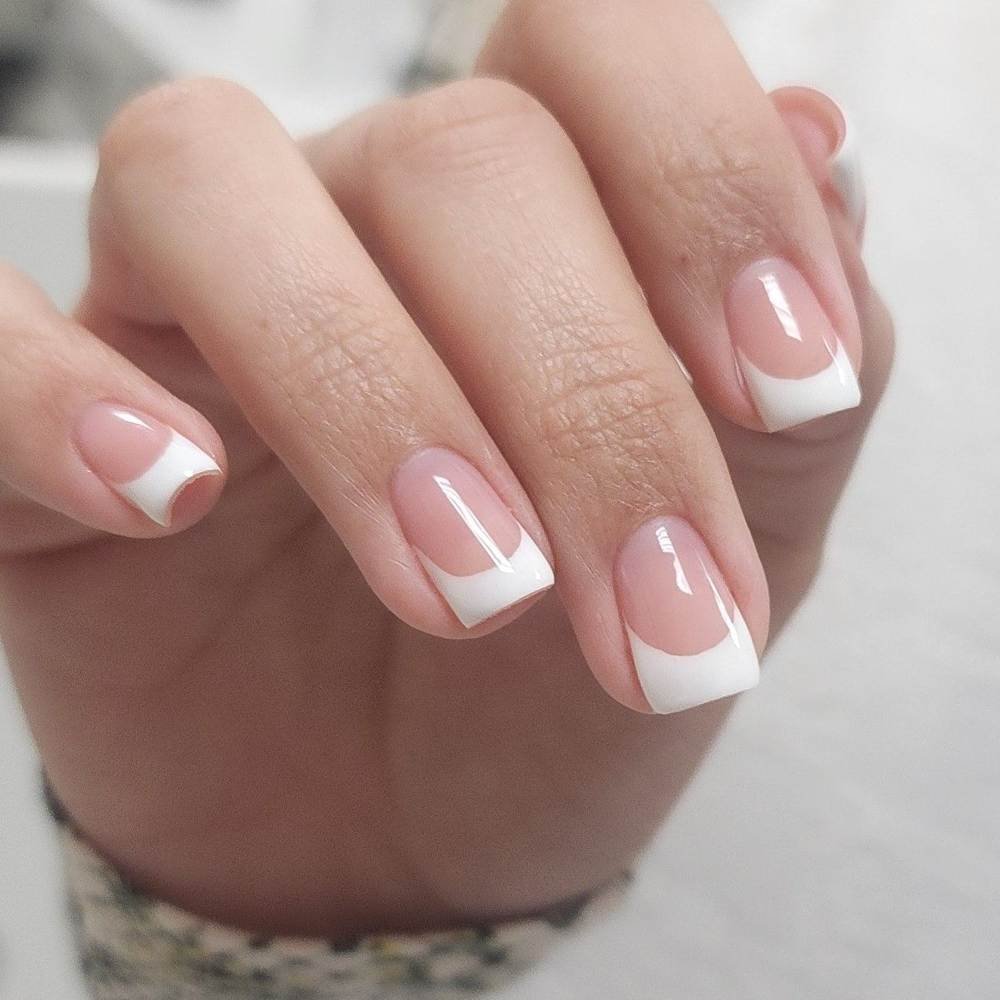 Classic nude nails with white French tips