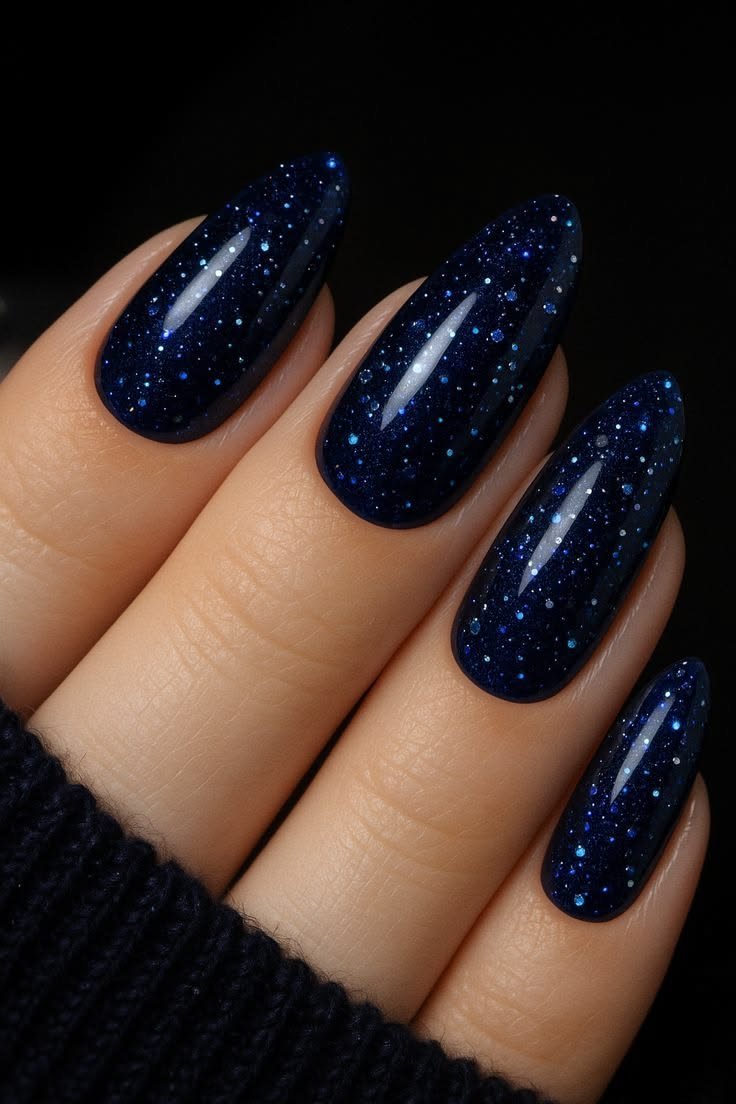 Midnight blue glitter galaxy winter nails