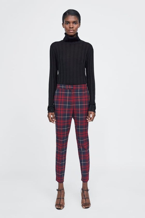 Black sweater red plaid pants