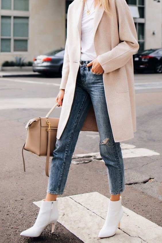 Boyfriend jeans with heeled booties and a long wool coat