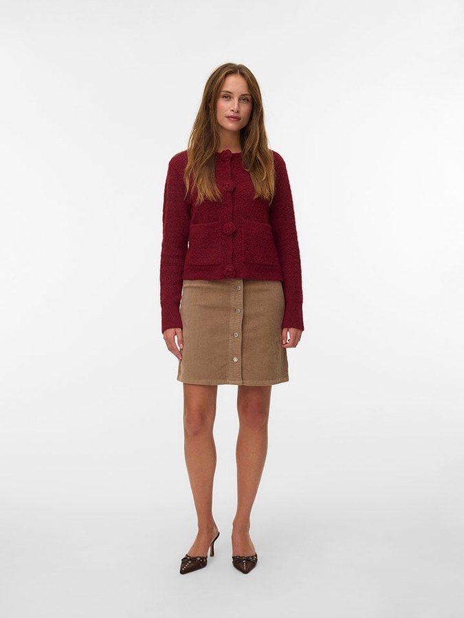 Cranberry corduroy skirt with a cream cardigan