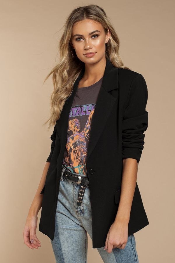 Oversized blazer over a graphic tee and jeans
