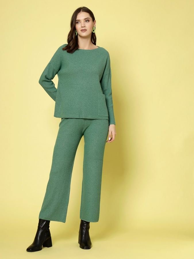 Woman in a sage green knit co-ord set
