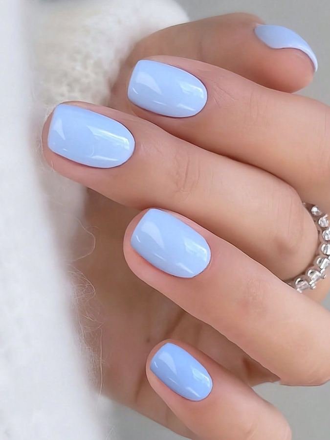 Clean simple blue winter nail design
