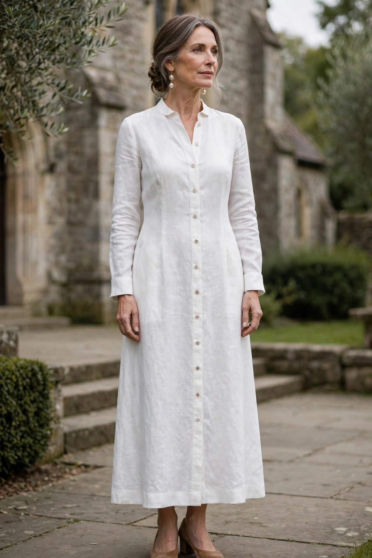 mature woman in a timeless white linen dress