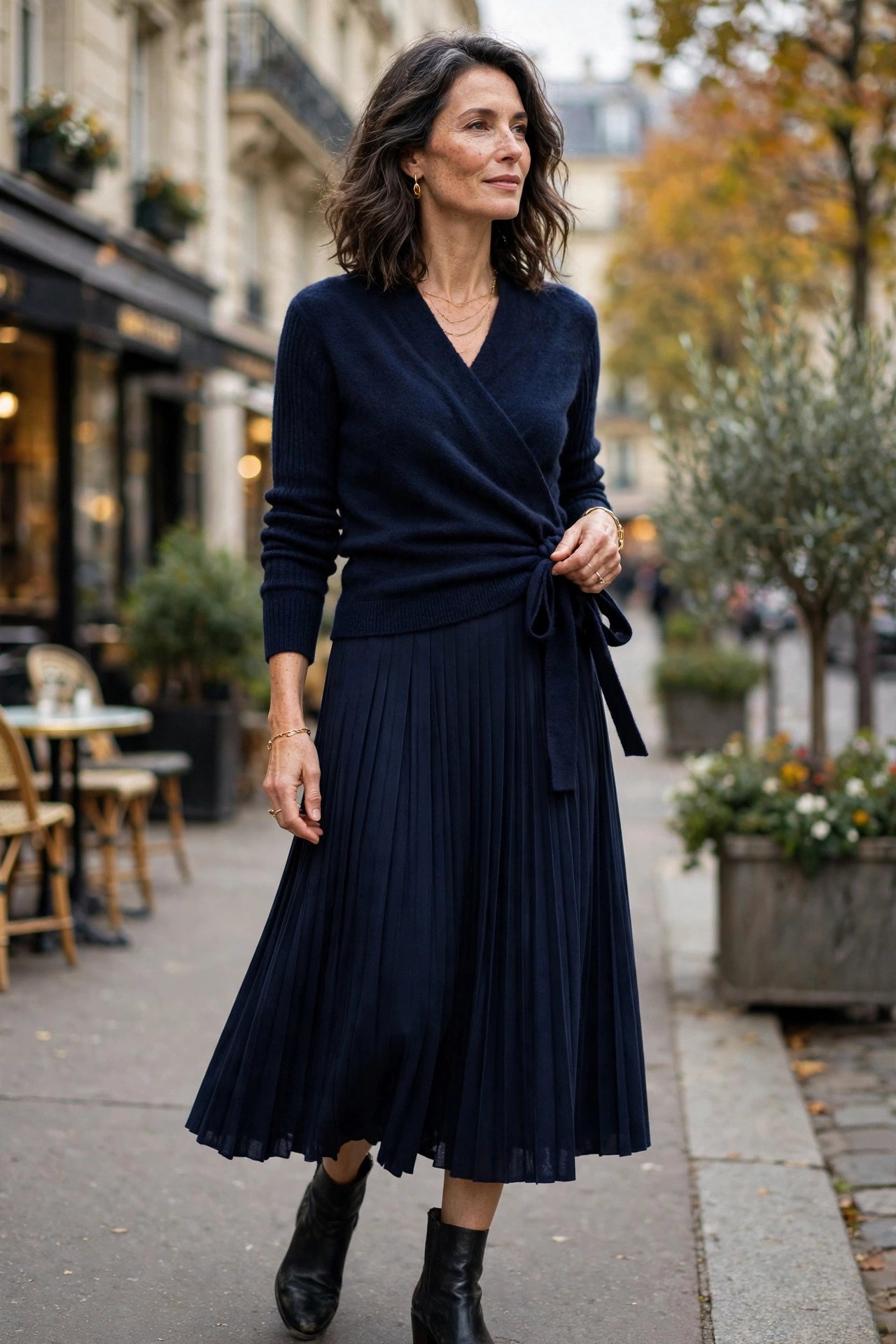 Midnight blue wrap sweater with pleated midi skirt