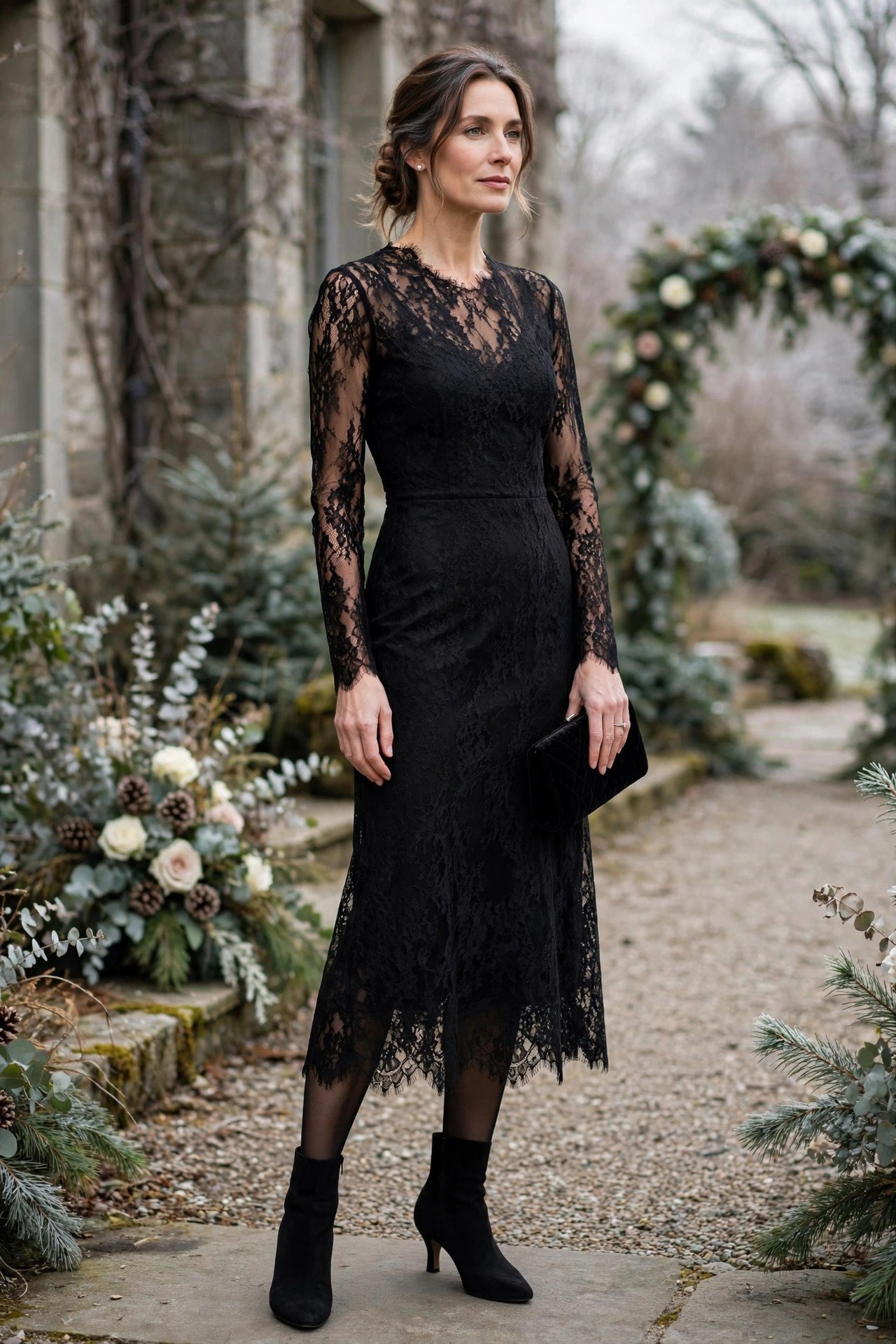 Woman in an elegant black lace dress