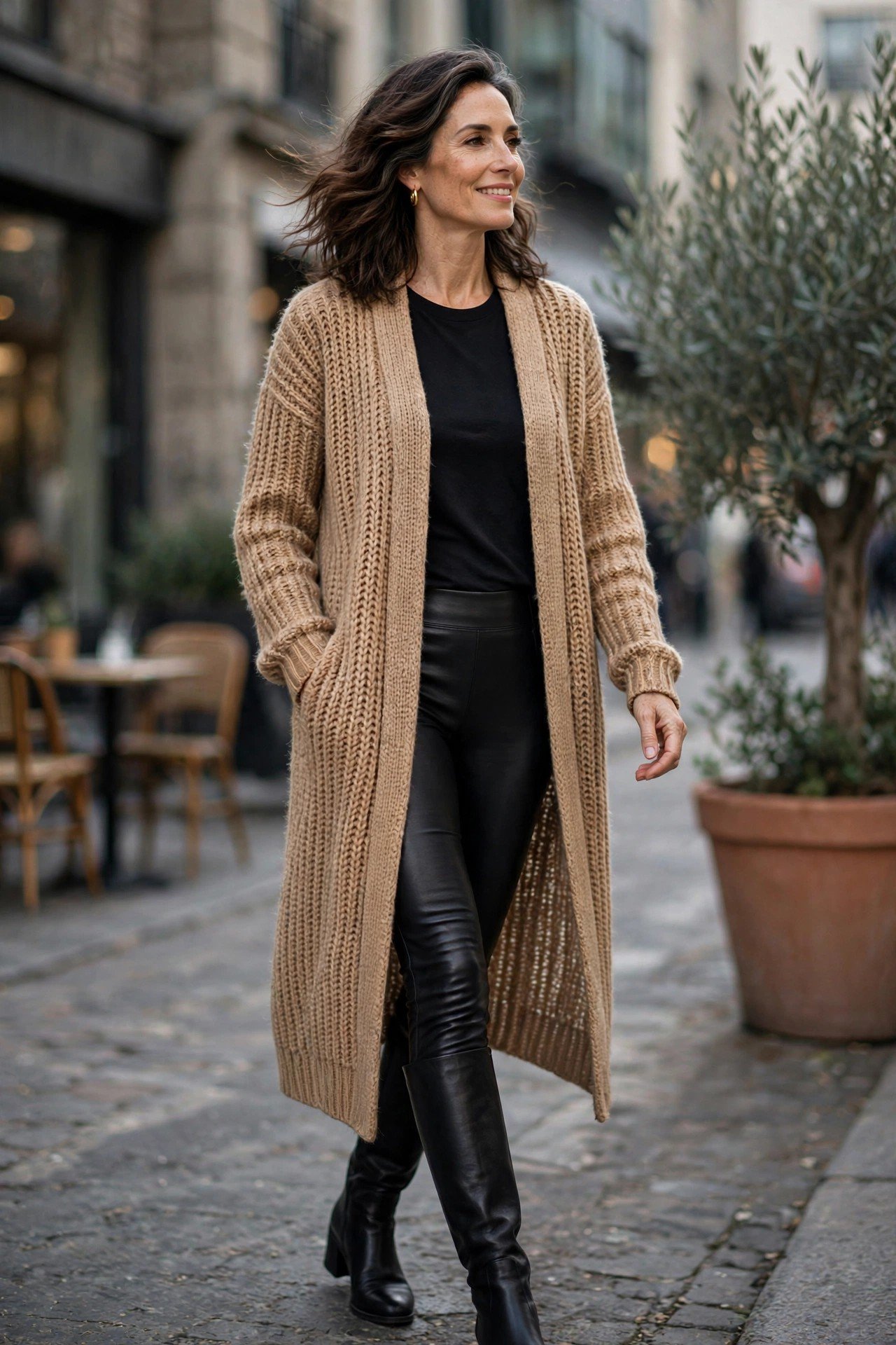 Black knee high boots with leather leggings and long cardigan