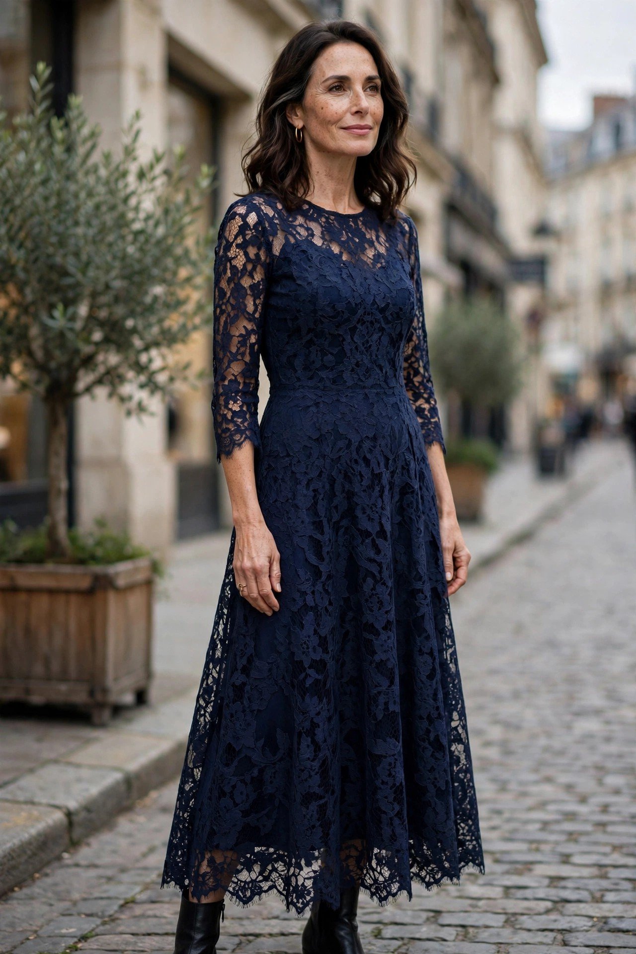 Elegant woman in navy lace dress