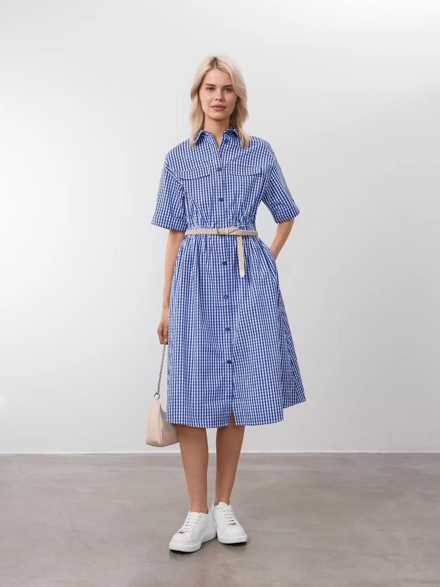 woman in a gingham check dress