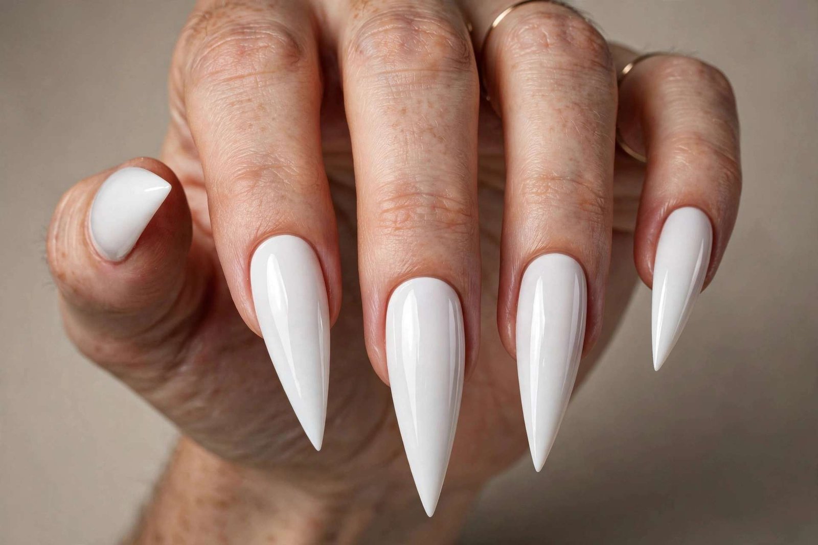 Arctic White Stiletto nail design