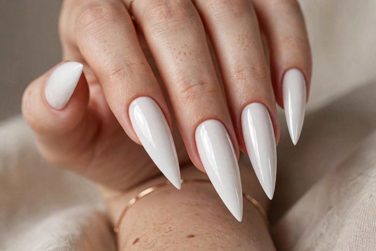 Arctic White Stiletto nail design